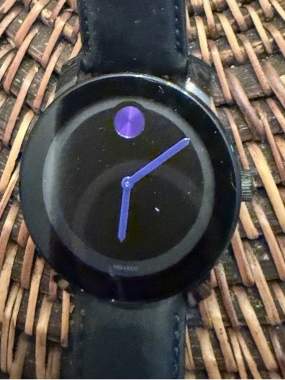 Movado Black Watch with Purple Hands and Dot Accent